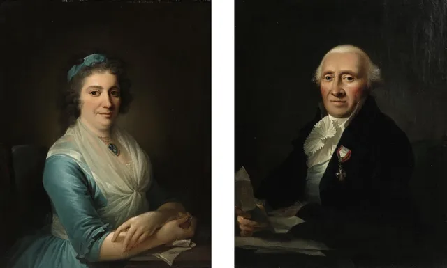 A pair of portraits. A woman in a pale blue dress and a pale blue ribbon in her hair and a man in a black jacket with the cross of the order of chivalry, holding a document in his hand. Both: Unsigned. Oil on canvas. 78×63 cm. (2).