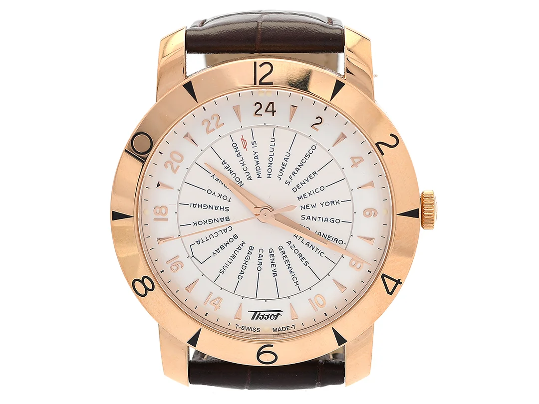 TISSOT, Heritage, Navigator, Chronometre, Cal 2893-3, Verk nr. 58639, Serie nr. BN3 CKC WH4, Ref nr. T915.641.76.037.00A, herrur, 43 mm, 18K rosa guld, automatisk, safirglas, 24-timmarsvisning, världstider, glasbaksida, läderband, viklås i doublé, cert, december 2017, box, ytterkartong, Limiterad och numrerad (Nr. 114/333). — Klockor/Tissot — Kaplans