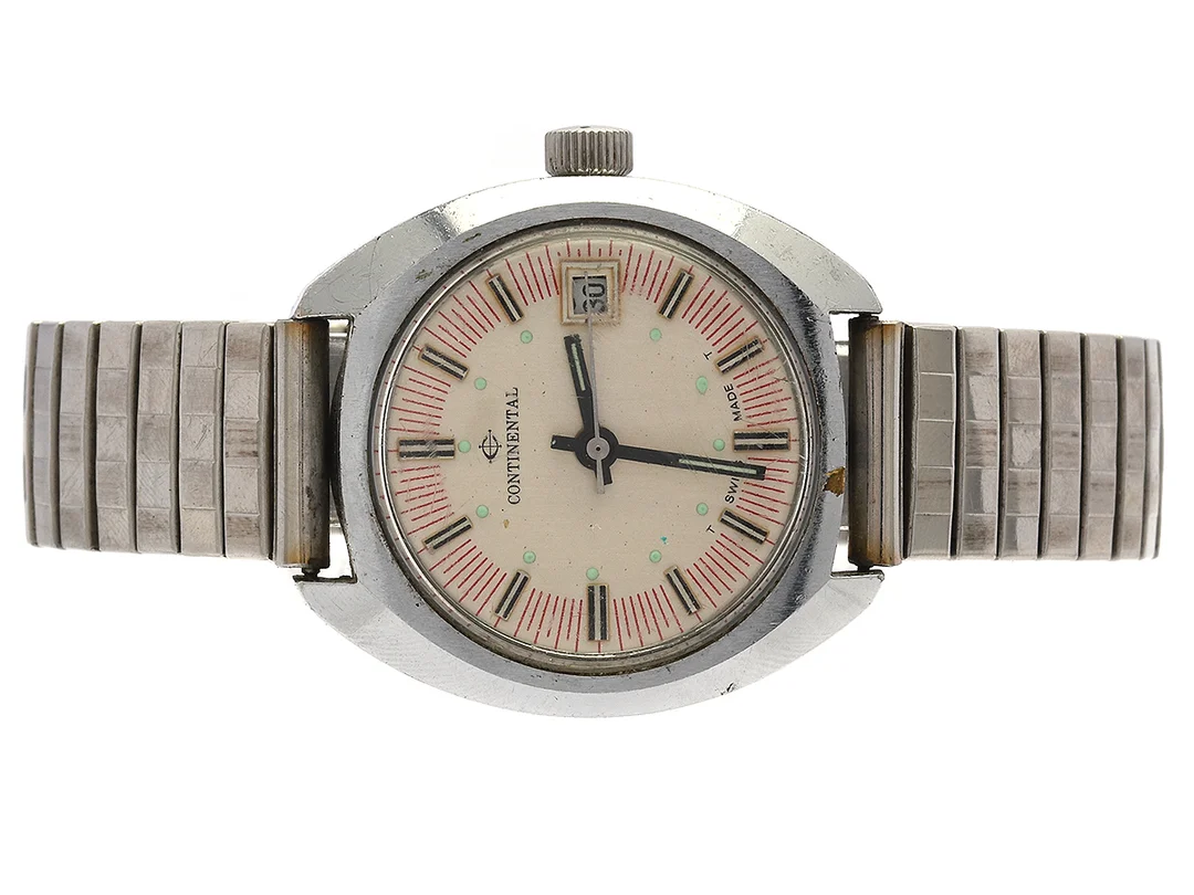 CONTINENTAL, herrur, 35,5 mm, vitmetall, manuell, datum, plexiglas, skadad urtavla, defekt, skadad boett, ca 1970, metallänk ej original. — Klockor/Övriga klockor — Kaplans