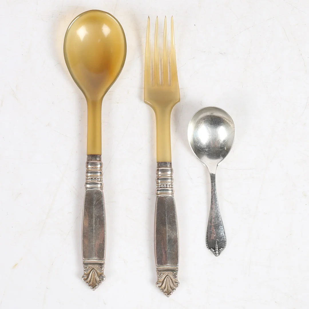 GEORG JENSEN. A SILVER AND HORN FORK & A SIMILAR SPOON (3). — Silver — Bishop & Miller