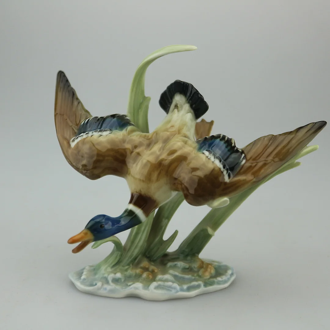 HUTSCHENREUTHER FLIEGENEDE ENTE PORZELLAN. — European — Kunst- und Auktionshaus Kleinhenz