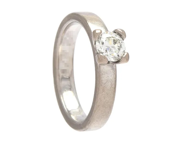 ENSTENSRING, 18K vitguld, briljantslipad diamant 0,50 ct enligt gravyr, ca TCr(I)/VS2, Schalins, stl 15,75 mm, gravyr, diamant med inverterad natural på rondisten.