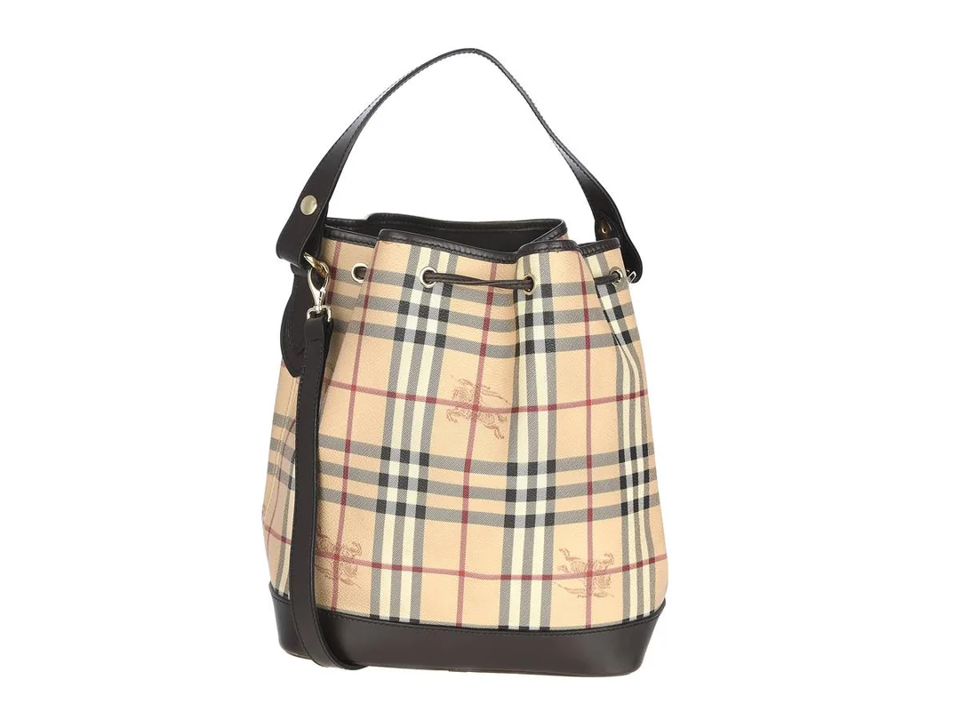 VÄSKA, BURBERRY, Bucket bag, rutigt canvas, brunt läder, 25x29x15 cm, dustbag. — Accessoarer/Väskor — Kaplans