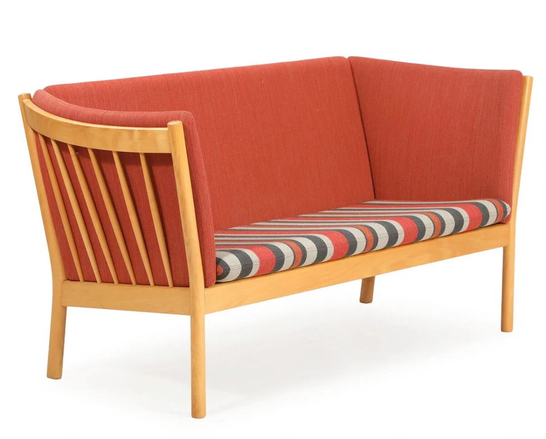 A two-seater beech sofa with loose cushions upholstered with reddish and striped wool. Model J48. Manufactured for FDB. L. 150 cm. — Modern Furniture — Bruun Rasmussen
