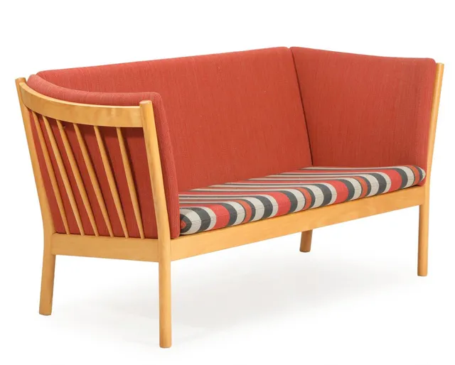 A two-seater beech sofa with loose cushions upholstered with reddish and striped wool. Model J48. Manufactured for FDB. L. 150 cm.