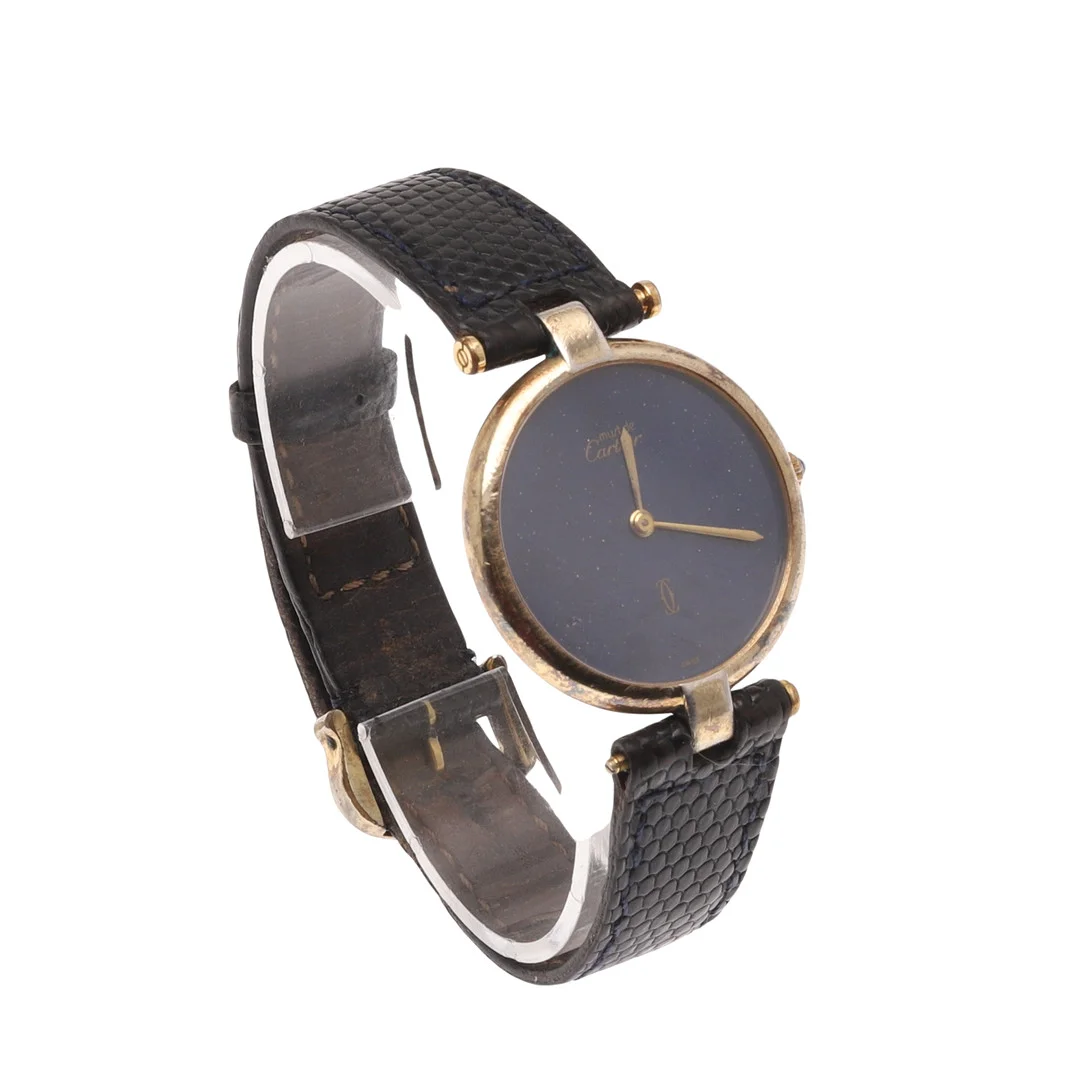A LADY'S SILVER GILT WRISTWATCH BY MUST DE CARTIER. — Wristwatches — Lawrences Auctioneers