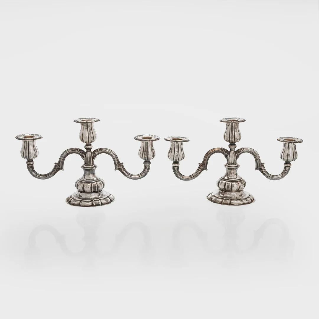 Carl M. Cohr, kandelabrar, ett par, silver, Fredericia, Danmark 1940. — Silver/Ljusstakar — Bukowskis