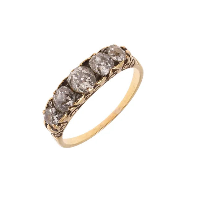 A LATE VICTORIAN DIAMOND FIVE STONE RING.