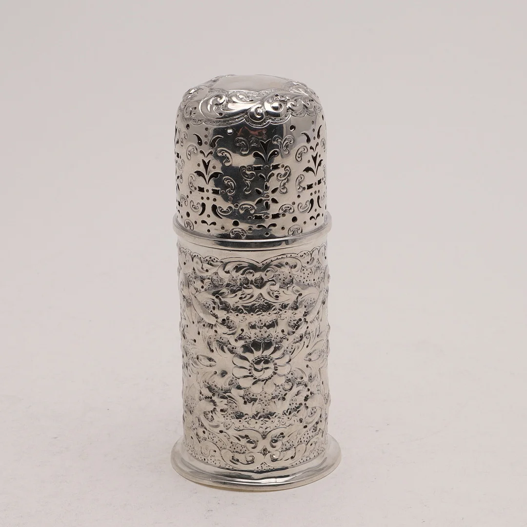 A LATE VICTORIAN EMBOSSED SUGAR CASTER. — Silver — Lawrences Auctioneers