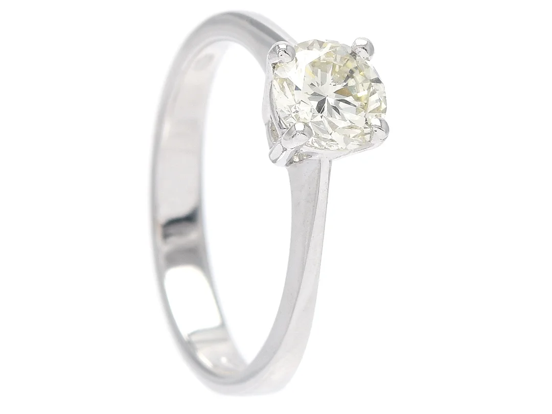 ENSTENSRING, 18K vitguld, briljantslipad diamant ca 0,93 ct, Ca(N)/VS2, GIA laserinskription 2195851707, stl 17,5 mm, vikt 3,4 g. — Smycken/Enstensring — Kaplans
