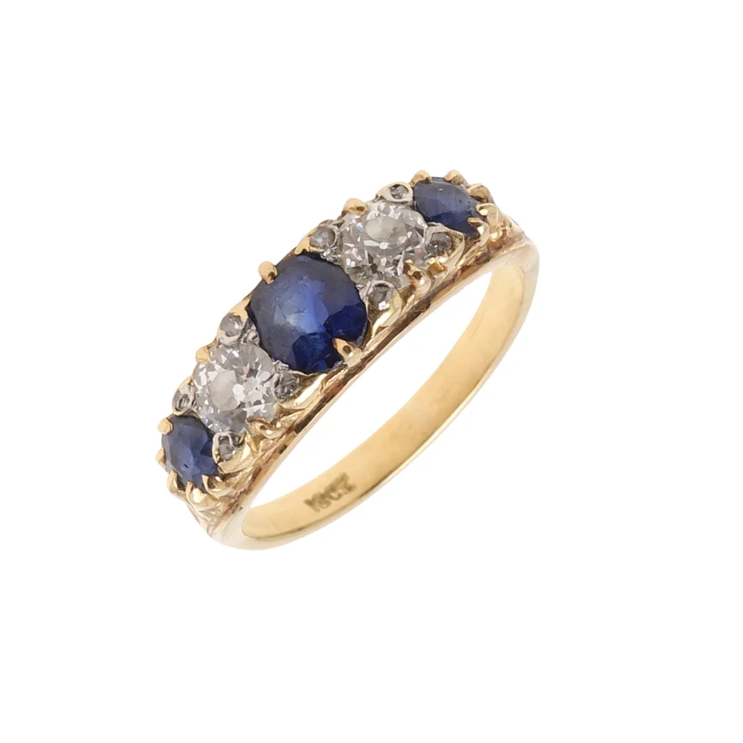 A SAPPHIRE AND DIAMOND FIVE STONE RING. — Rings — Lawrences Auctioneers