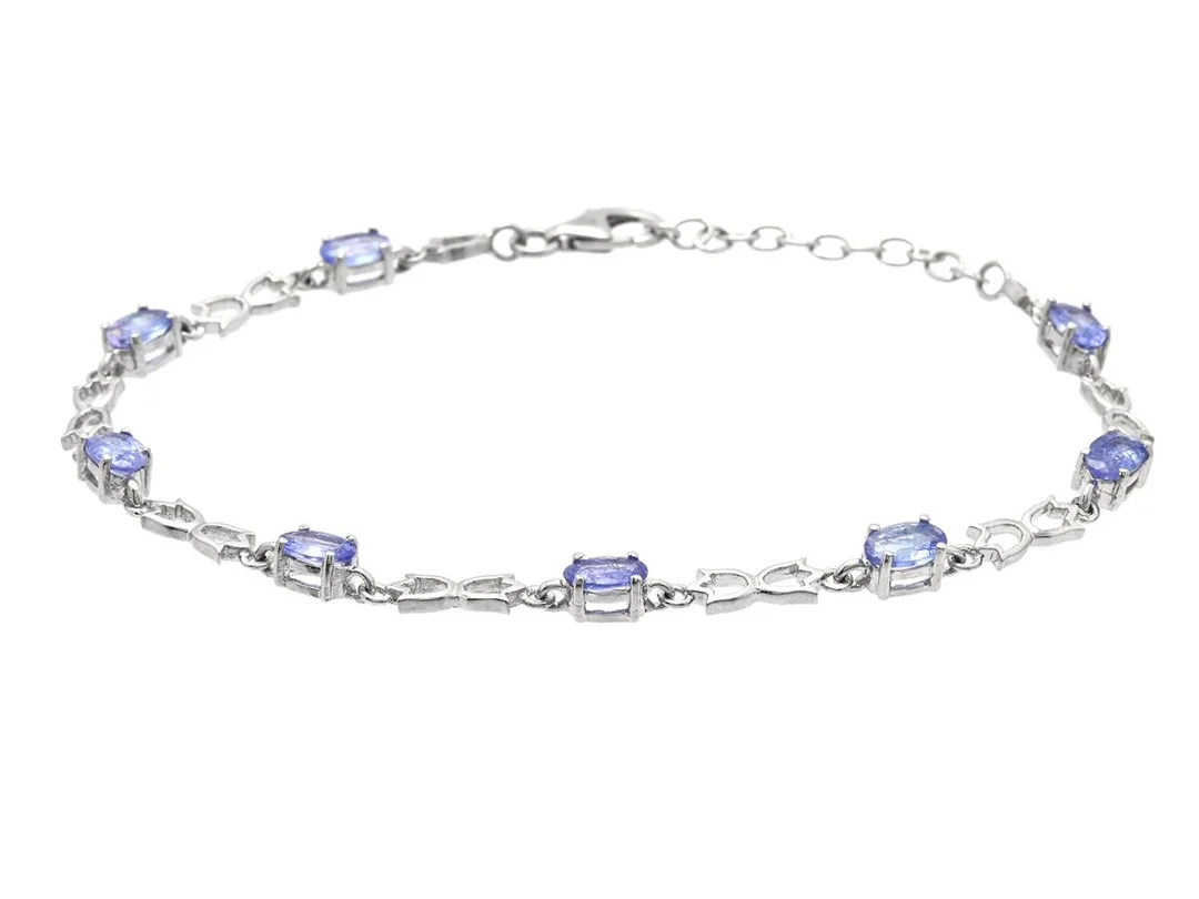 ARMBAND, sterlingsilver, ovalslipade tanzaniter, längd ca 19-22 cm, vikt 6,0 g, tanzaniter med nagg. — Smycken/Armband — Kaplans