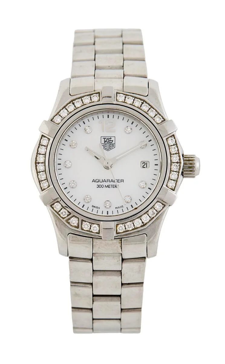 Aquaracer 300 of steel with mother-of-pearl dial and diamond-set bezel, ref. WAF1416.BA0824. Quartz movement with date indication. TAG Heuer bracelet of steel with fold-over clasp. Circumference approximately 15 cm. Ø 27 mm. 2000s. — Clocks & watches/Wristwatches — Bruun Rasmussen