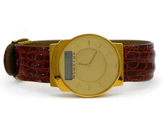JUNGHANS, Mega, Serie nr. 259157103, Ref nr. 2050, herrur, 35 mm, analog/digital, precisionstyrd av radiovågor, 18K guld, quartz, mineralglas, läderband, originalspänne, ca 1990.