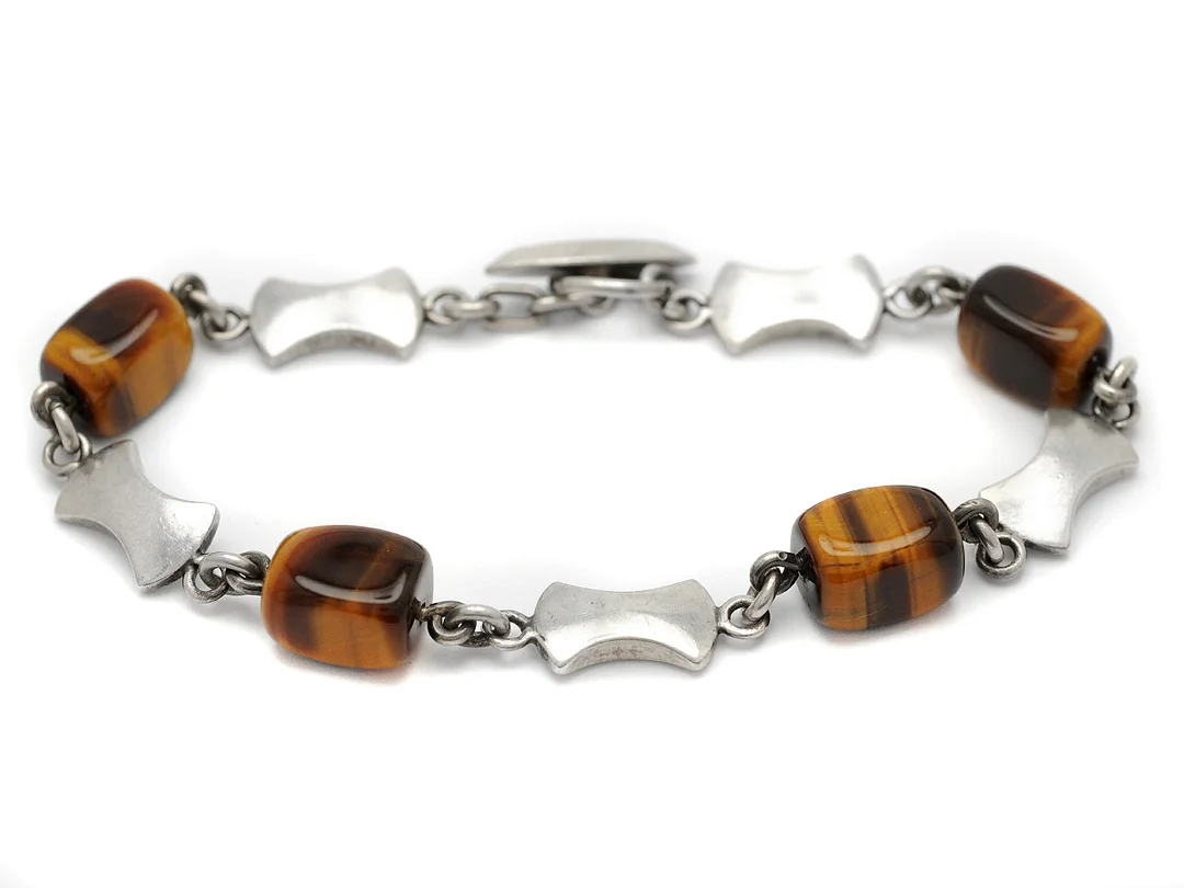 ARMBAND, silver, tigeröga, svenska stämplar 1969, längd 20 cm, vikt 21,8 g. — Smycken/Armband — Kaplans