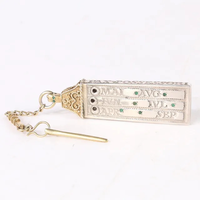 A SILVER AND PARCEL GILT REPLICA OF THE SAXON CANTERBURY SUNDIAL.