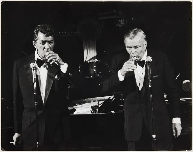 RON GALELLA. Frank Sinatra and Dean Martin, 1983.