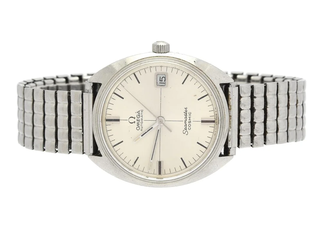 OMEGA, Seamaster, Cosmic (-T Swiss Made T-), Cal 565, Serie nr. 25366154, Ref nr. ST 166.0026, Boett nr. 166.00026, herrur, 35 mm, stål, automatisk, plexiglas, datum, skadad urtavla, defekt (akut servicebehov), ca 1967, metallänk ej original. — Klockor/Omega — Kaplans