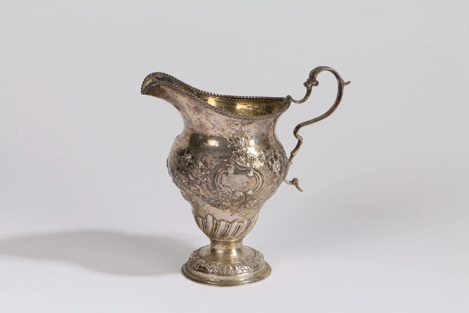 LATE VICTORIAN SILVER CREAM JUG. — Silver — Bishop & Miller