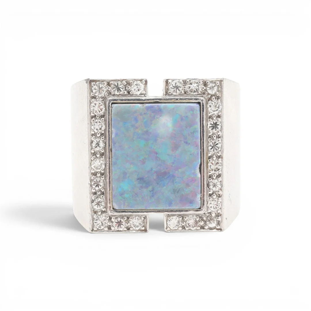 ORIOL SUNYER. Opal and diamonds signet ring, circa 1970. — Rings — Balclis