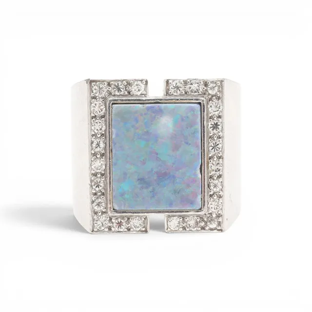 ORIOL SUNYER. Opal and diamonds signet ring, circa 1970.