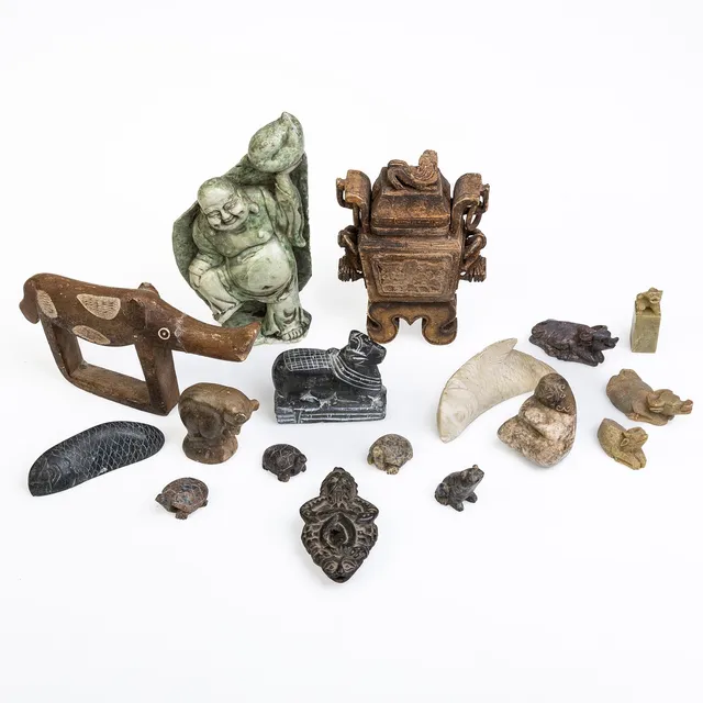 A COLLECTION OF CARVED SOAPSTONE ITEMS.