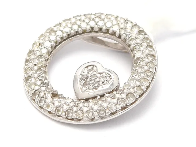 Hänge 18K vitguld 1,3g Ø1,3cm, med diamanter 78xca0,005ct