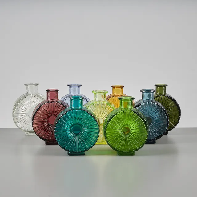 HELENA TYNELL. FLASKOR, 9 st, "Solflaskan, 1/4", Riihimäen Lasi Oy. I produktion 1964-1974.
