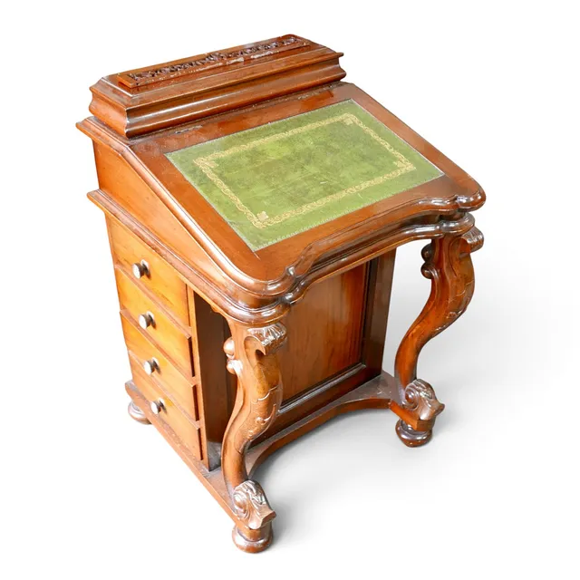 A MODERN MAHOGANY DAVENPORT DESK.