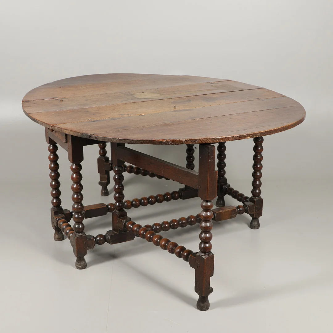 A LATE 17TH CENTURY OAK GATELEG TABLE. — Tables — Lawrences Auctioneers