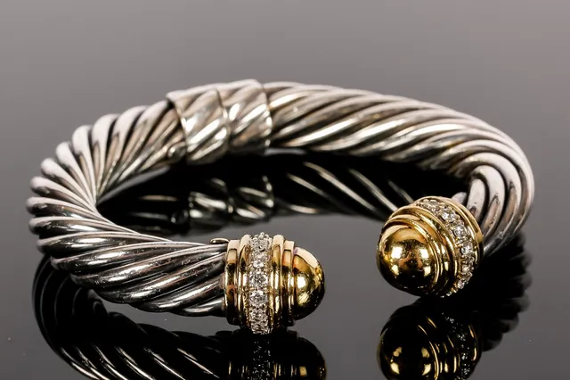 David Yurman. Armbånd af sterlingsølv og 18 kt guld, 0.16 ct