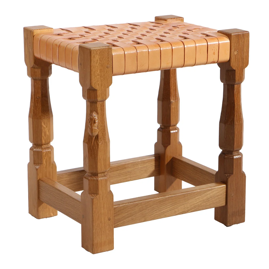 ROBERT MOUSEMAN THOMPSON OF KILBURN: AN ENGLISH OAK AND LATTICE WORK STOOL. — Sofas & Seatings — Bishop & Miller