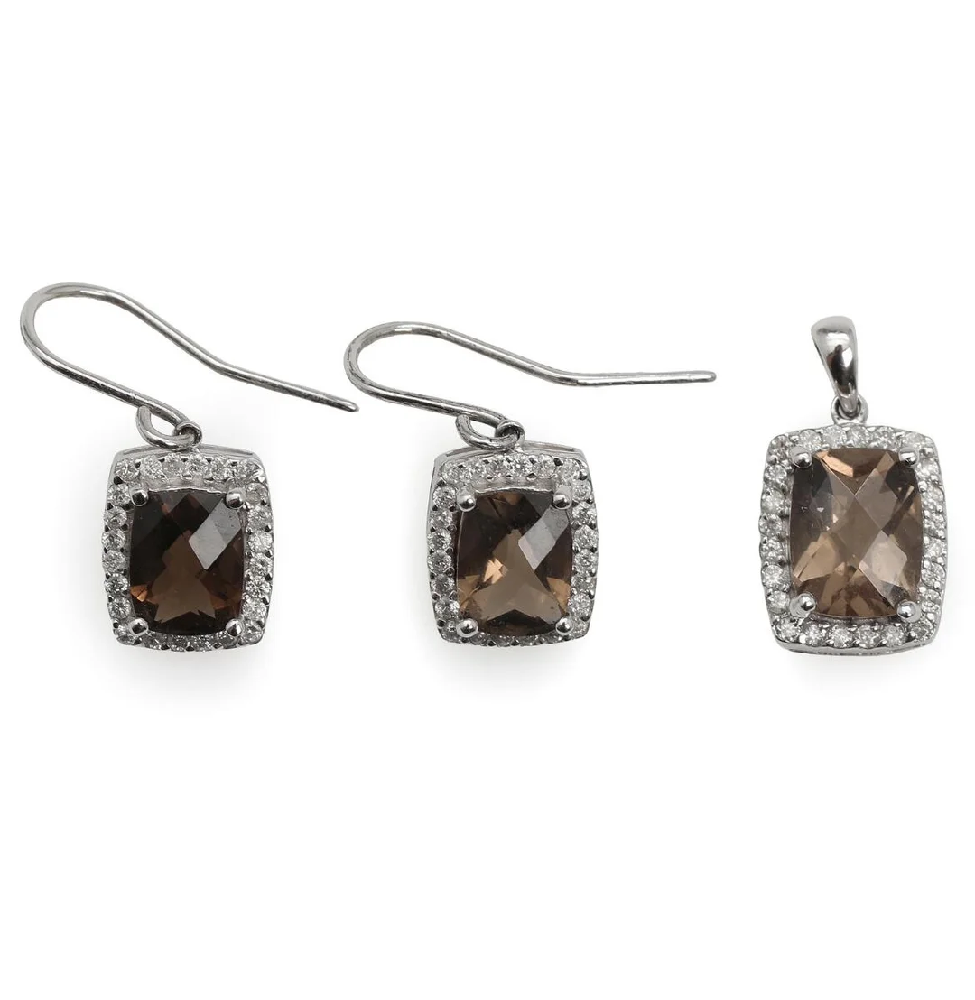Diamond and smoky quartz pendant and ear pendants each set with faceted smoky quartz encircled by numerous brilliant-cut diamonds, mounted in 14k white gold. Total weight app. 4.5 g. L. 1.8–2.4 cm. (3) — Jewellery/Earrings — Bruun Rasmussen