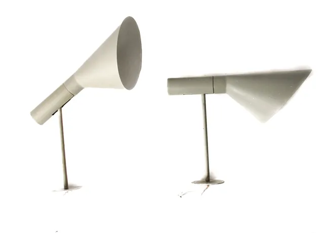 Arne Jacobsen. Two vintage AJ wall lamps, grey. (2)