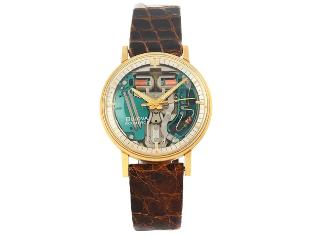 BULOVA, Accutron, "Spaceview", Cal 214 H (M8), Serie nr. M5, Boett nr. 1-484465 / 340-1, herrur, 35,5 mm, 18K guld, stämgaffel, plexiglas, läderband, originalspänne i doublé, ca 1966, träbox.