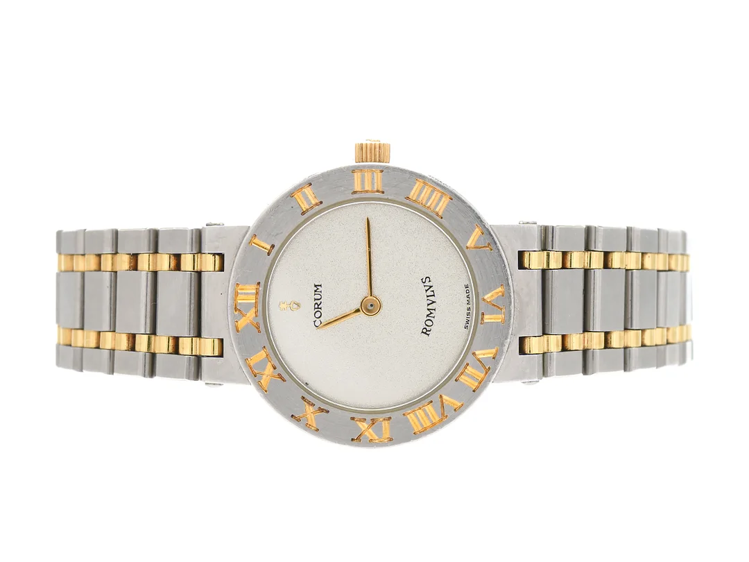 CORUM, ROMVLVS, Verk nr. 270709, Serie nr. 424996, Boett nr. 24.103.21V48, damur, 24 mm, bicolour, quartz, safirglas, originallänk, viklås, ca 1995. — Klockor/Corum — Kaplans