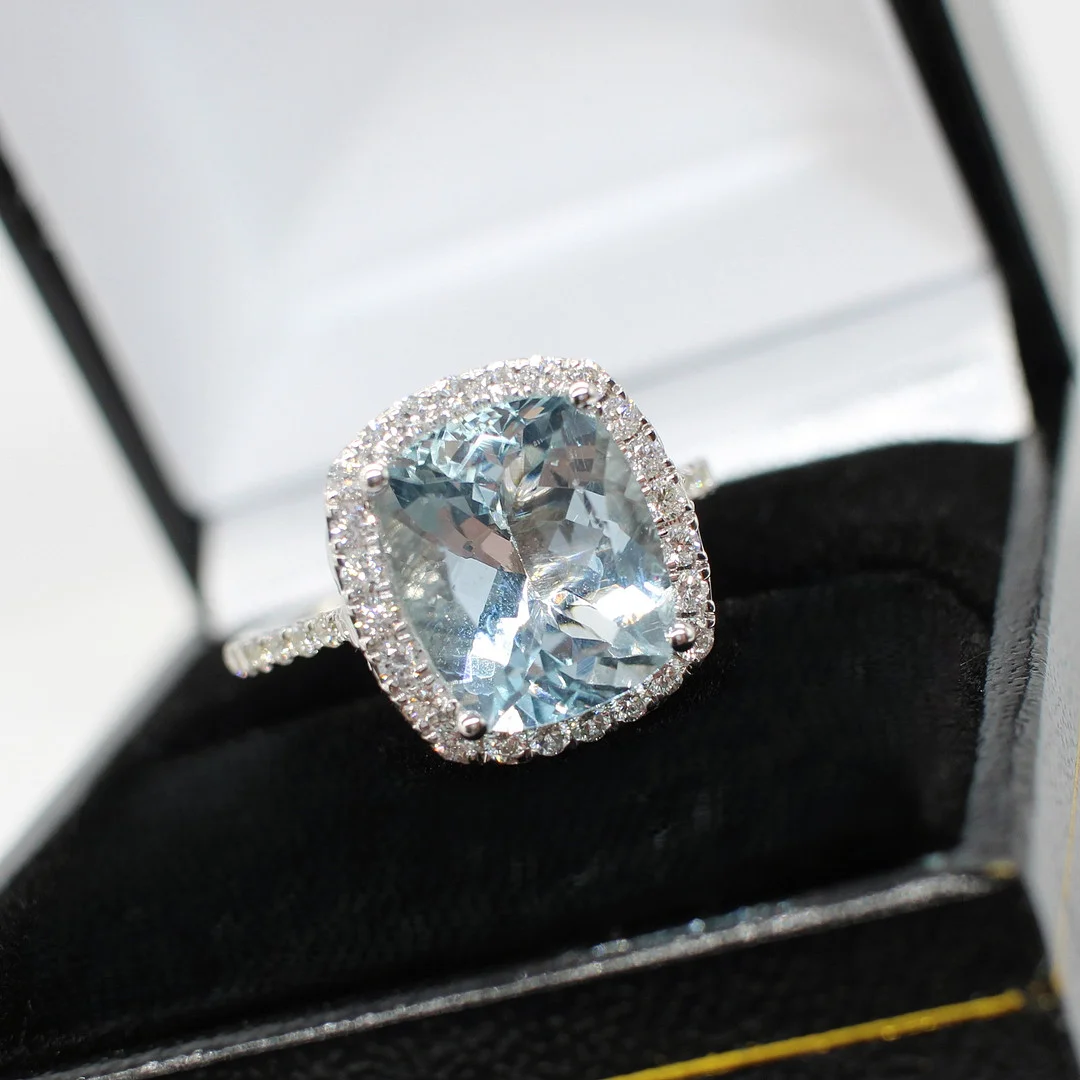 AQUAMARINE & DIAMOND CLUSTER RING. — Rings — Rumsey’s Auctioneers