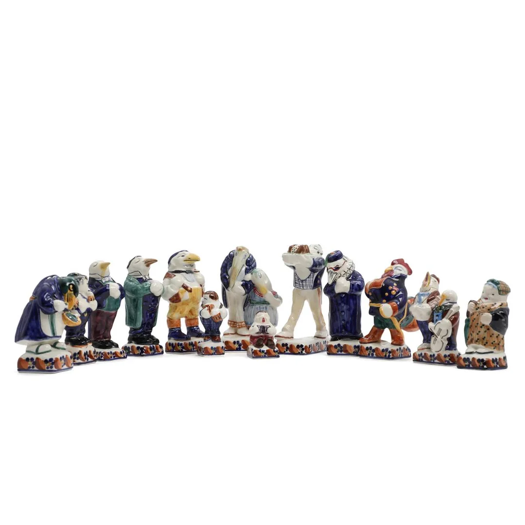 “I skoven skulle være gilde”. Complete series of 13 faience figures, decorated in colours. Aluminia. H. 6–15.5 cm. (13) — Faience, Clay- & Stoneware — Bruun Rasmussen