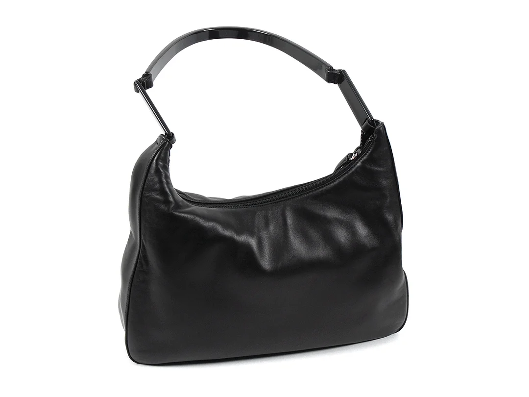 VÄSKA, PRADA svart läder/ handtag svart plast 33x26x6 cm dustbag — Accessoarer/Väskor — Kaplans