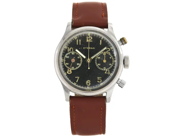 ETERNA, kronograf, herrur, 37,5 mm, Cal 703 E (Valjoux 22), Serie nr. 2865429, Boett nr. 2794479, stål (Staybrite), manuell, plexiglas, renoverad urtavla, utbytta visare (relumade/målade), läderband, ca 1940.