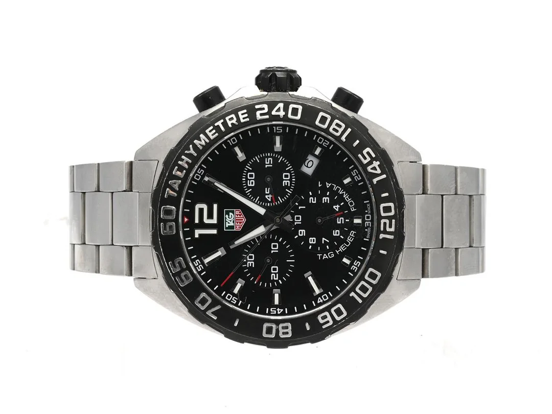 Tag Heuer, Formula 1, 41 mm, stål, kvarts (går ej, trol. batteri), kronograf, datum, boett nr: CAZ1110, ref. CAZ1110.BA0877, sn: RZN9178, stålarmband med viklås, kortad, extra länkbitar, bruksslitage, cert 2016 box, ytterbox. — Klockor/Heuer — Kaplans
