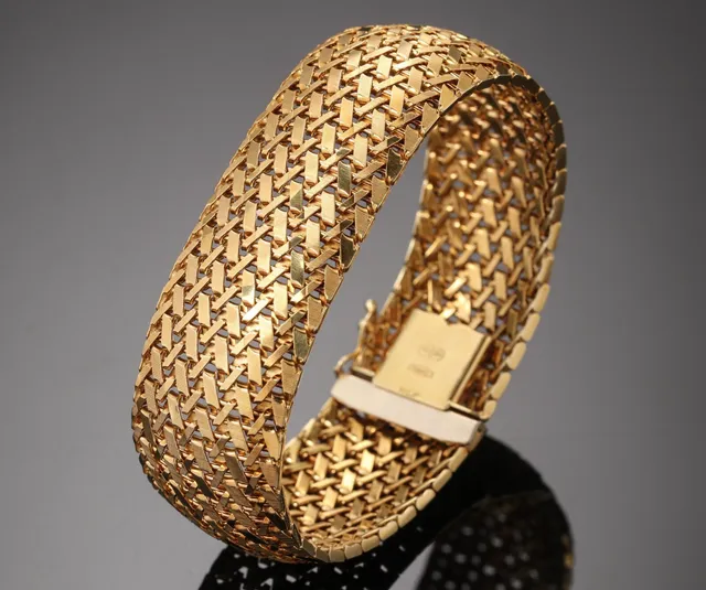 Hugo Grün. Bredt ambånd af 14 kt. guld, ca. 54,4 g.