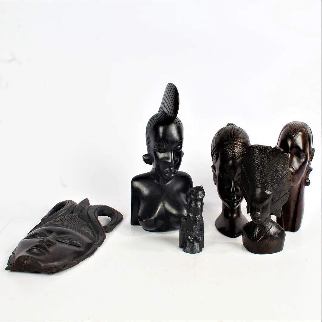 A COLLECTION OF AFRICAN HARDWOOD HEADS AND MASKS. — Other — Bishop & Miller