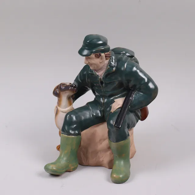 EWA JARENSKOG. för JIE, figurin, jägare med hund.