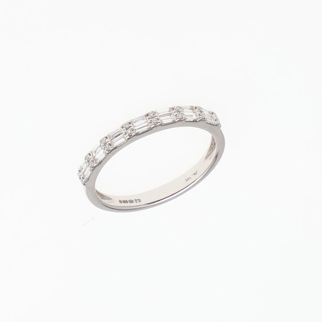 A DIAMOND HALF HOOP RING. — Objet de vertu & Miscellaneous — Lawrences Auctioneers