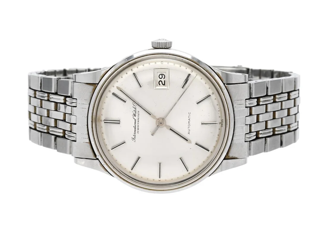 INTERNATIONAL WATCH Co, Schaffhausen, herrur, 34 mm, Cal 8541, Serie nr. 1750724, Ref nr. 809 A, Boett nr. 1733863, stål (Staybrite), automatisk, plexiglas, datum, originallänk (Gay Frères), viklås, Ref nr. 1.66/1B, ca 1966. — Klockor/IWC — Kaplans