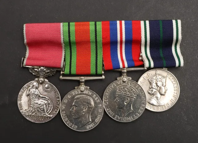 A SECOND WORLD WAR CIVIL DEFENCE GALLANTRY GROUP OF FOUR TO A FEMALE RECIPIENT WITH THE MECHANISED TRANSPORT SERVICE.