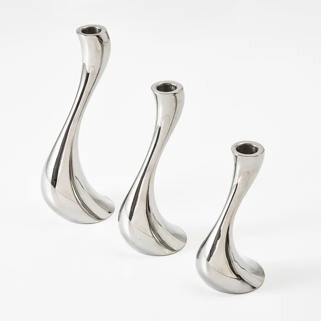 CONSTANTIN WORTMANN. Ljusstakar, 3 st, modell "Cobra" för Georg Jensen.
