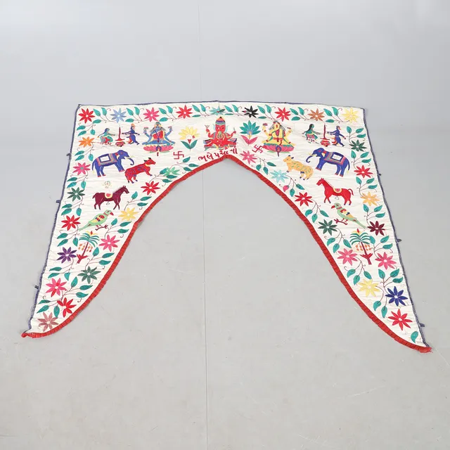 AN INDIAN COTTON DOOR HANGING.