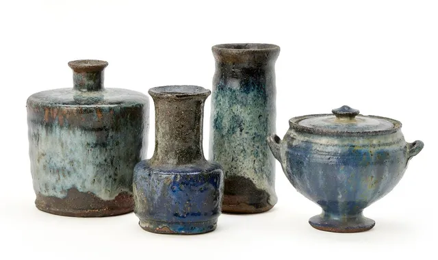Three earthenware vases and a lid jar, decorated with grey, reddish brown and blue Borax glaze. Two marked monogram for Gutte Eriksen, one signed Gutte and one marked monogram for Ib Hansen. Unique. H. 8.5–11.8 cm. (4)